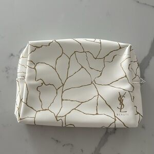 YSL Beauty white and gold marble cosmetic bag